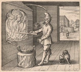 A man in early modern clothing wearing a hat is heating a fire in a hearth with a rod. Next to him is a bowl full of gold coins on a stump and a dog. There is a man in a background courtyard.